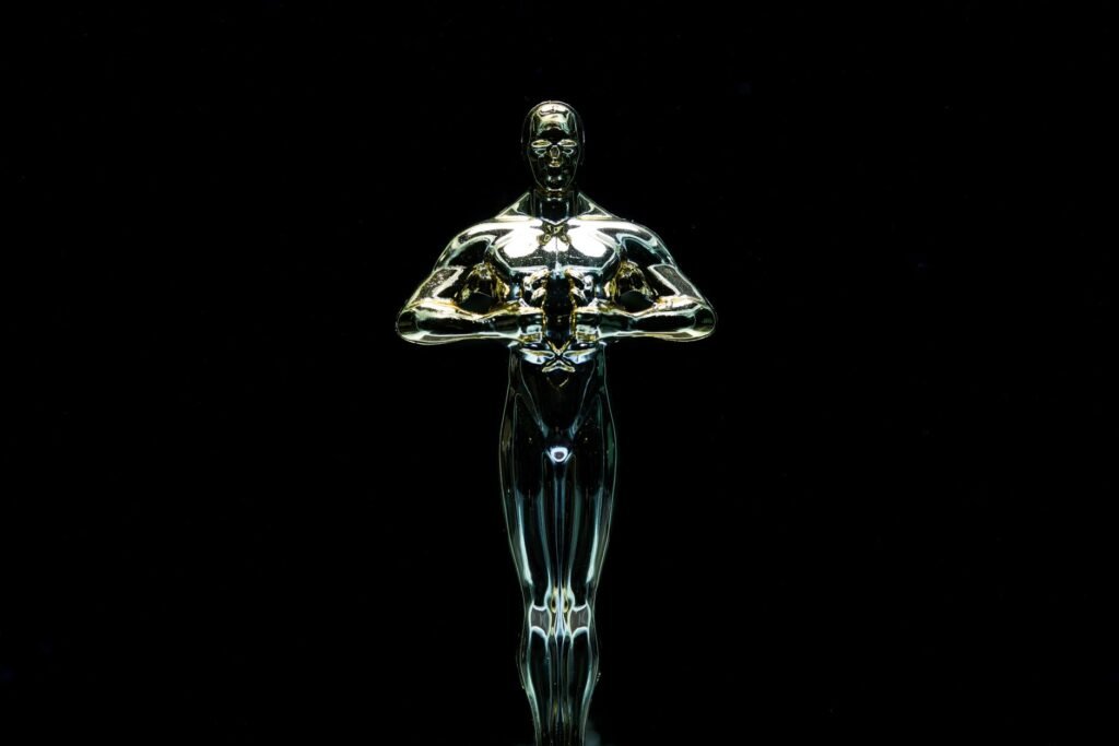 Golden award trophy statuette on display representing film industry awards