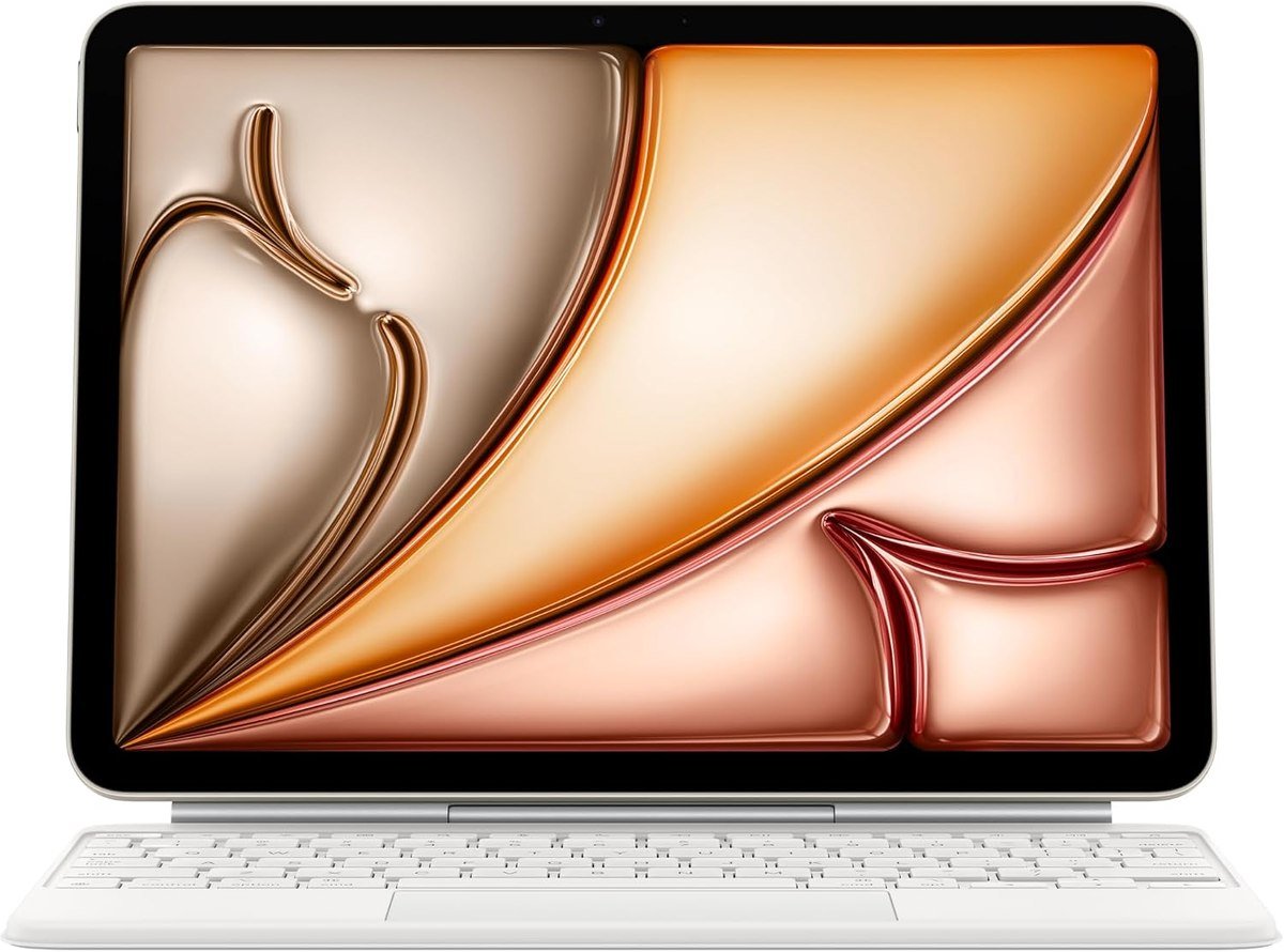 Apple Magic Keyboard in white holding an 11-inch iPad Air on its floating cantilever hinge