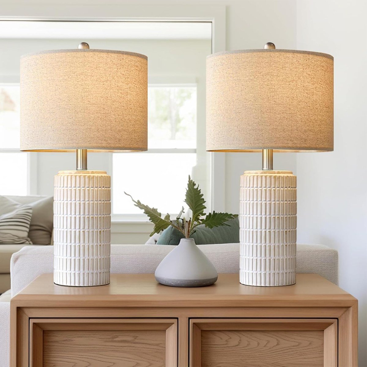 Pair of PoKat white ceramic table lamps with beige shades