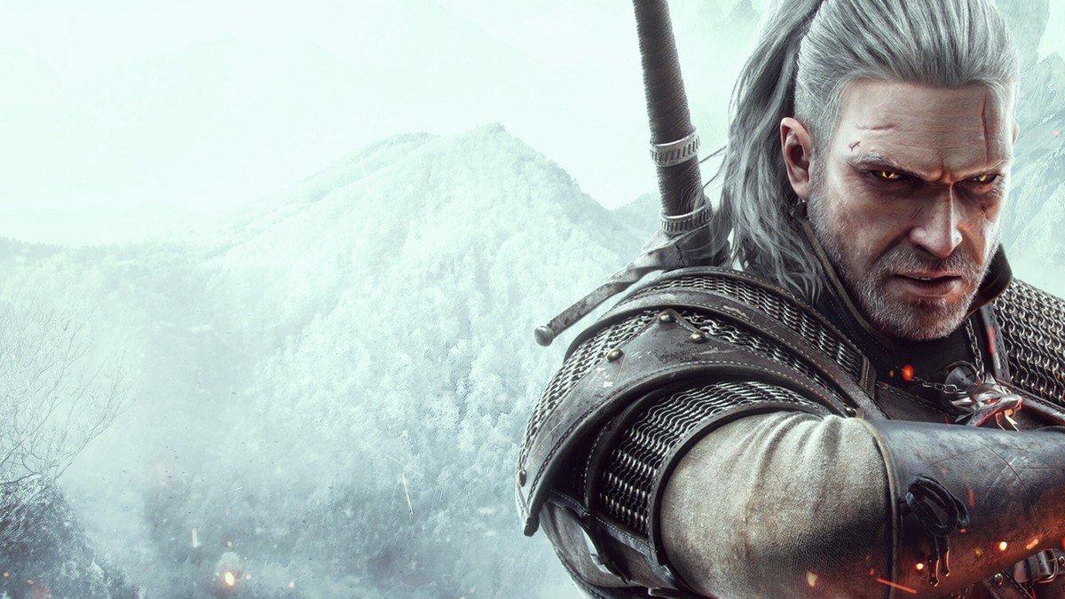 Geralt of Rivia with white hair and a sword on his back in front of a misty snowy mountain
