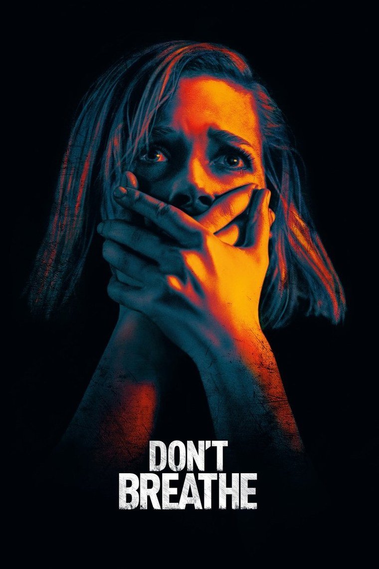 Don't Breathe poster showing a blind man standing in a darkened hallway