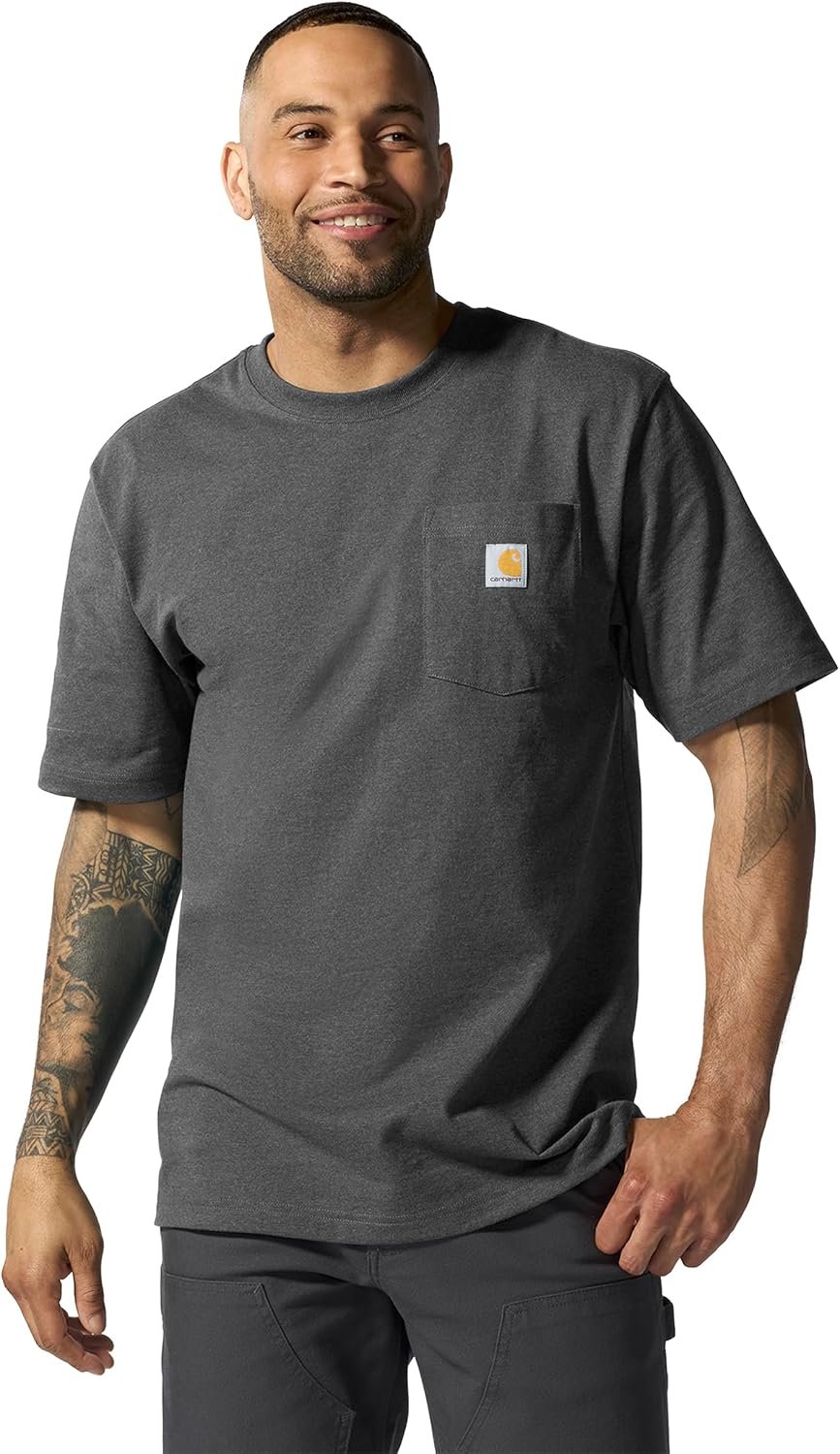 Man in a grey Carhartt K87 pocket t-shirt showing the chest pocket and loose body