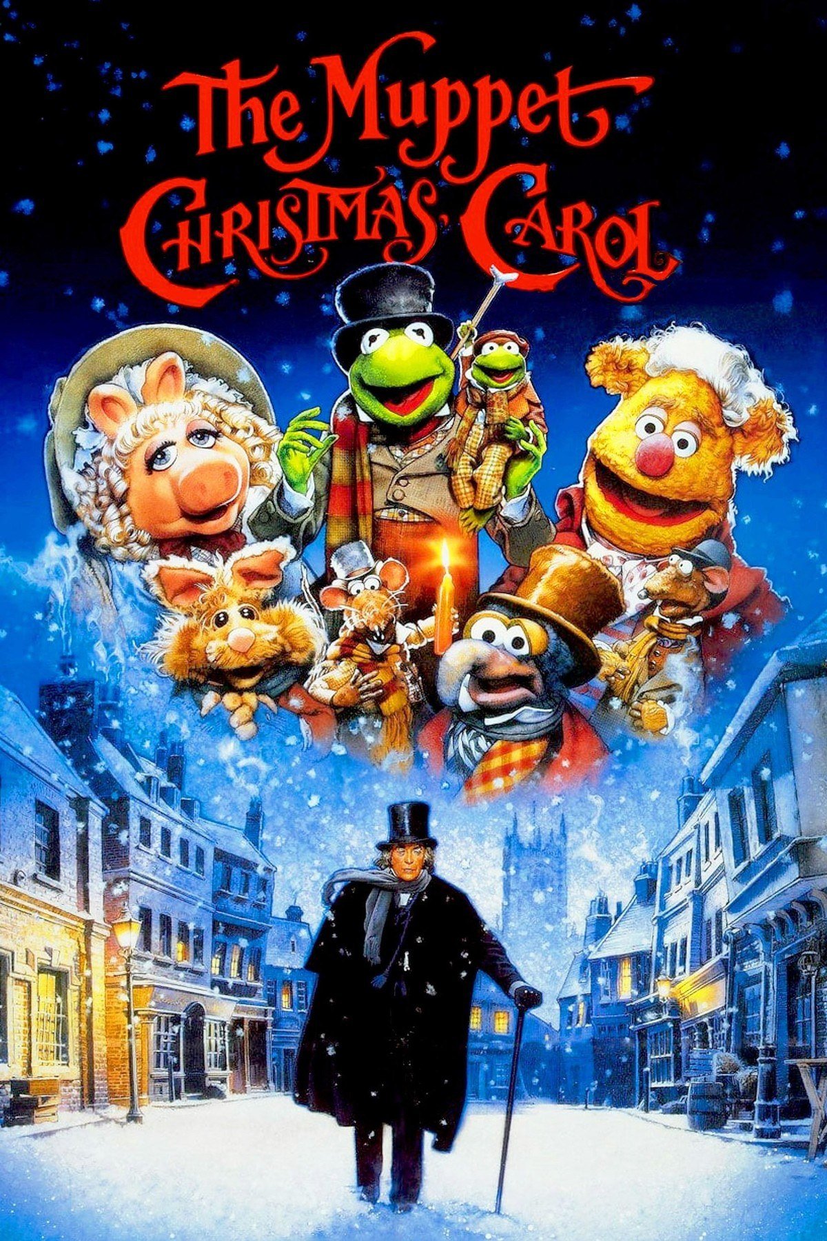 The Muppet Christmas Carol poster with Kermit, Miss Piggy and friends above Michael Caine's Scrooge