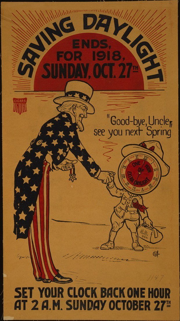 1918 United Cigar Stores poster reading Saving daylight ends Sunday, Oct. 27, set your clock back one hour at 2 a.m.