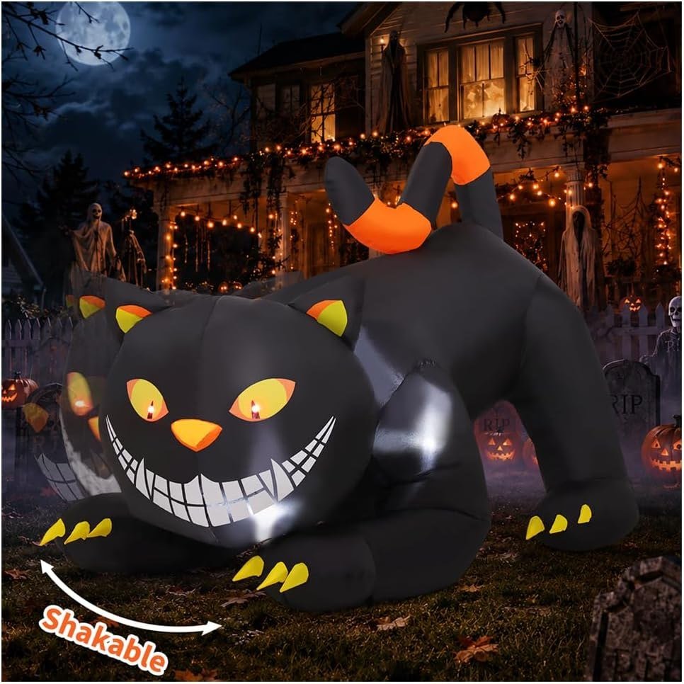 GOOSH 6 ft grinning black cat inflatable with glowing eyes on a lawn at night