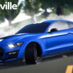 A blue Shelby Mustang doing a burnout on a Greenville street