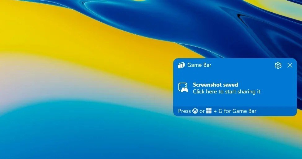 Game Bar notification reading Screenshot saved on the Windows 11 desktop