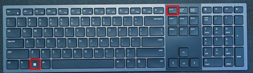 Full keyboard with the Windows key and the prt sc key outlined in red