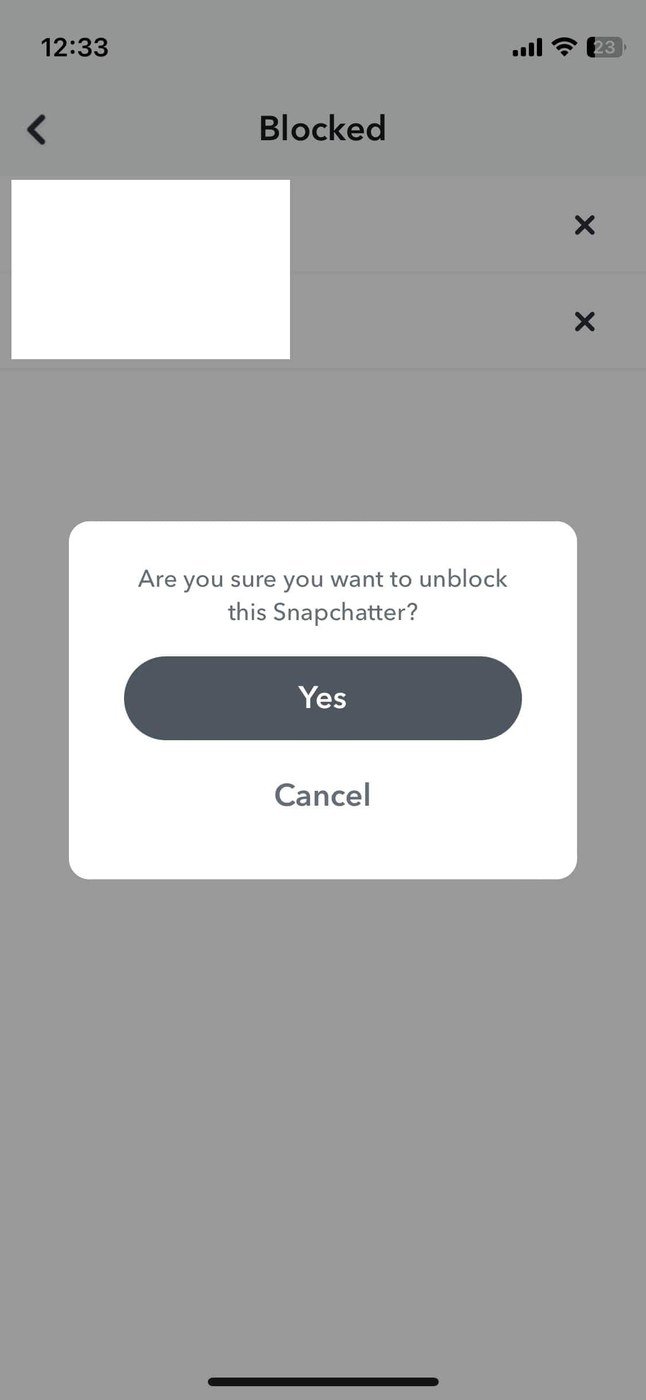 The Snapchat Blocked list asking to confirm unblocking a Snapchatter