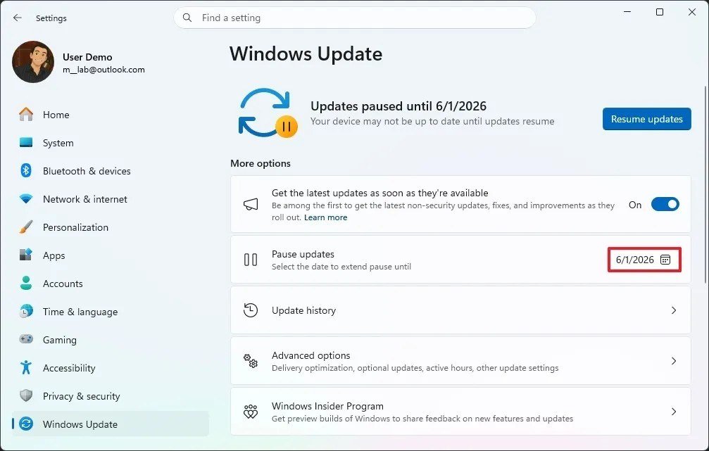 Windows 11 Windows Update page showing Updates paused with a Resume updates button and a Pause updates date field