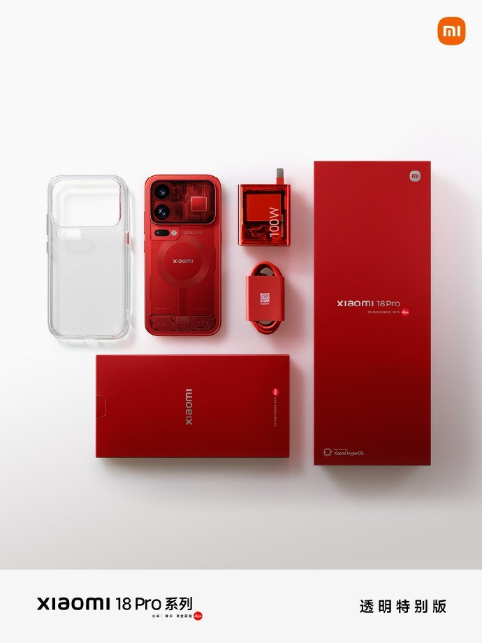 Transparent Edition retail kit laid out: red phone, clear case, red 100W charger, red cable and red gift box